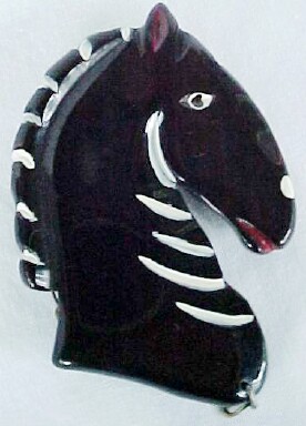 BP229 black bakelite zebra sew on